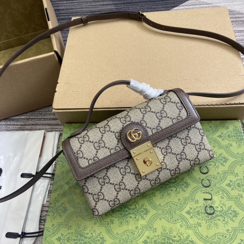 G*u*i top handle bags